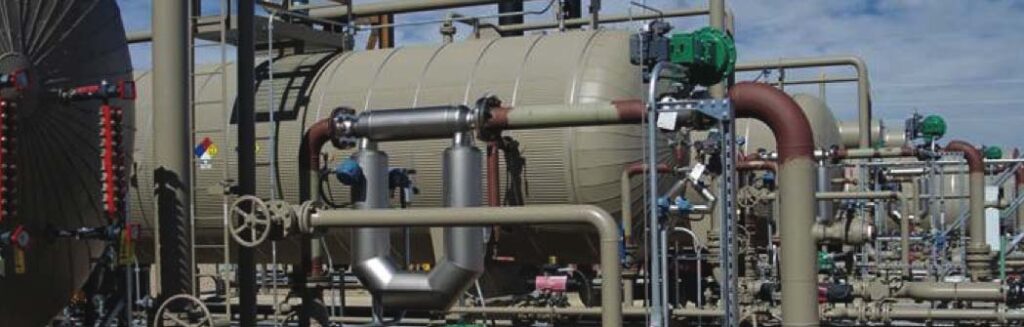 Horizontal three-phase separator with associated process piping, valves, and instrumentation, showcasing Halker’s oil, water, and gas separation engineering expertise and precision in designing efficient upstream production equipment.