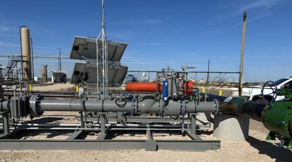 Natural gas meter skid with flow measurement equipment, process piping, valves, and support structures installed on a concrete foundation, highlighting Halker’s expertise in precision metering, tie-in engineering, and midstream facility integration.