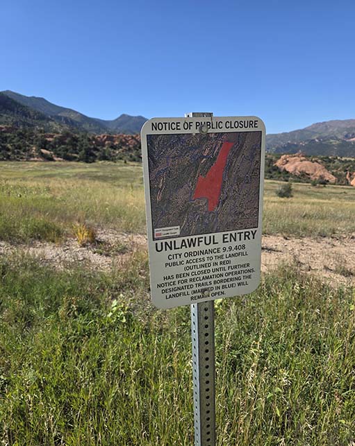 A public closure notice posted at a reclaimed landfill site, reflecting Halker's expertise in environmental compliance, site assessments, and support for land restoration and long-term stewardship.